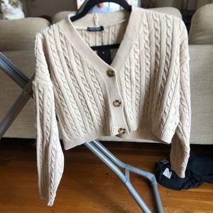Size M Nasty Gal cropped sweater. New with tags!